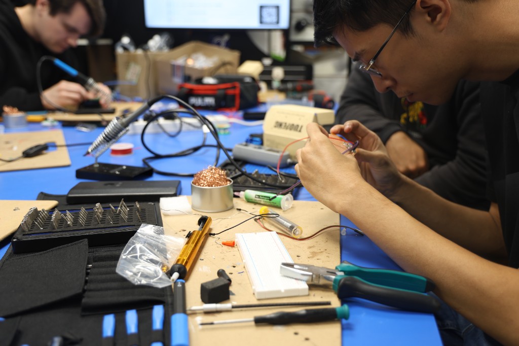 KCL students building hardware together